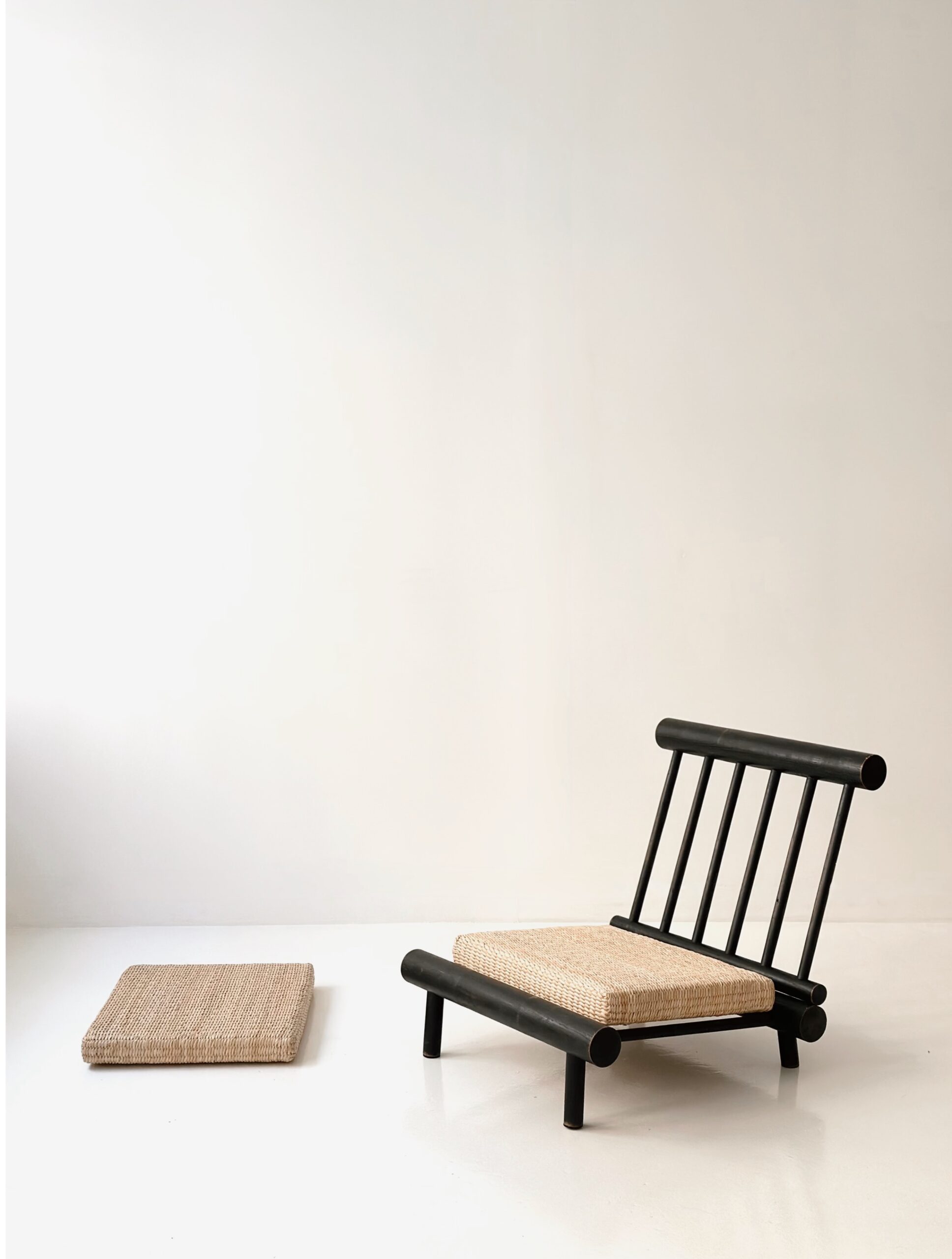 CHARLOTTE PERRIAND “LA CACHETTE” SLIPPER CHAIR